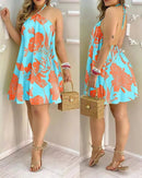 Vestido estampado tropical Bella Verão.
