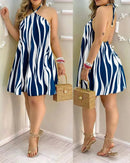 Vestido estampado tropical Bella Verão.
