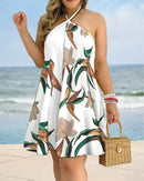 Vestido estampado tropical Bella Verão.